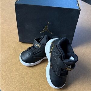 Jordan Kids Black Sneakers with Gold Highlights
